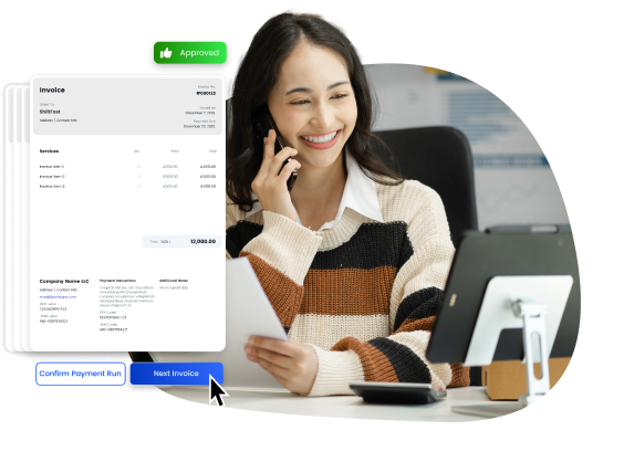 Image of a person at a desk smiling as she makes easier payments 